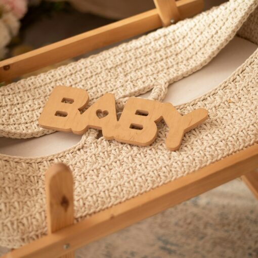 Baby's cradle is ready for a newborn.