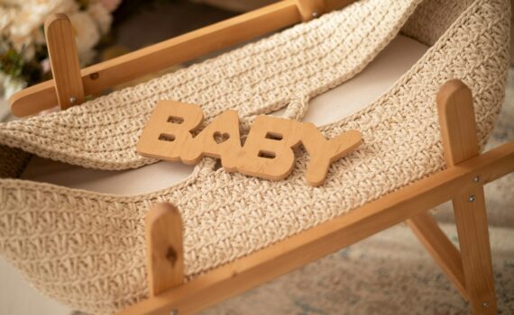 Baby's cradle is ready for a newborn.